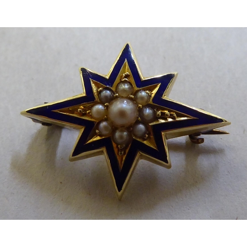 375 - A yellow metal, enamel and pearl set, star design brooch, possibly 15ct