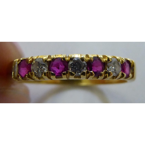 377 - An 18ct gold ruby and diamond set ring