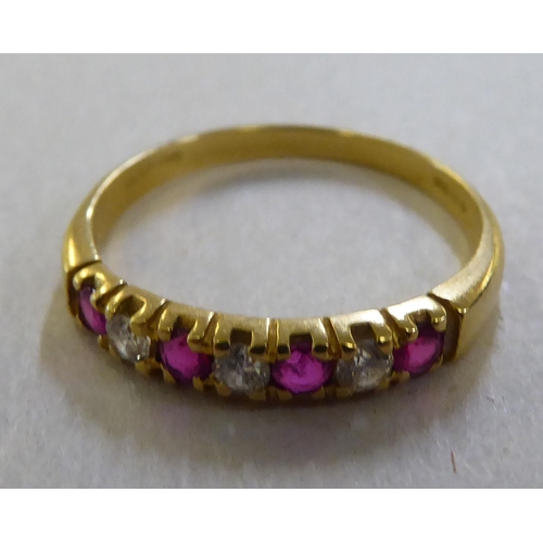 377 - An 18ct gold ruby and diamond set ring