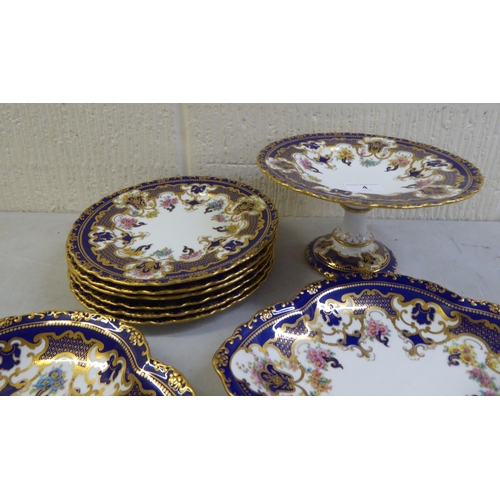 4 - Royal Crown Derby china teaware, decorated in Royal blue and gilt with floral motifs: to include a t... 