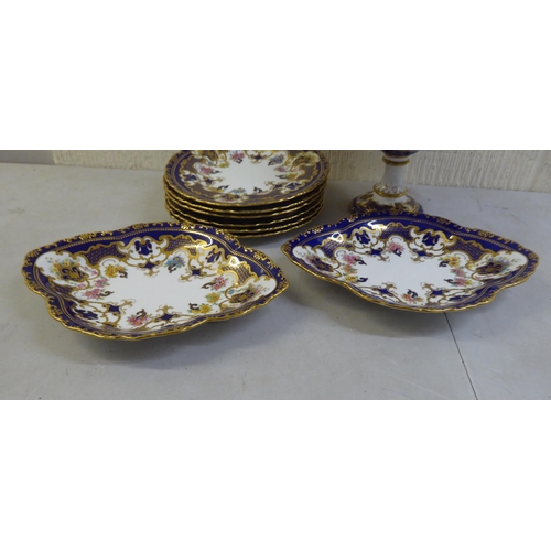 4 - Royal Crown Derby china teaware, decorated in Royal blue and gilt with floral motifs: to include a t... 