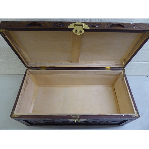 45 - A modern Chinese carved and varnished hardwood chest with straight sides and a hinged lid  11