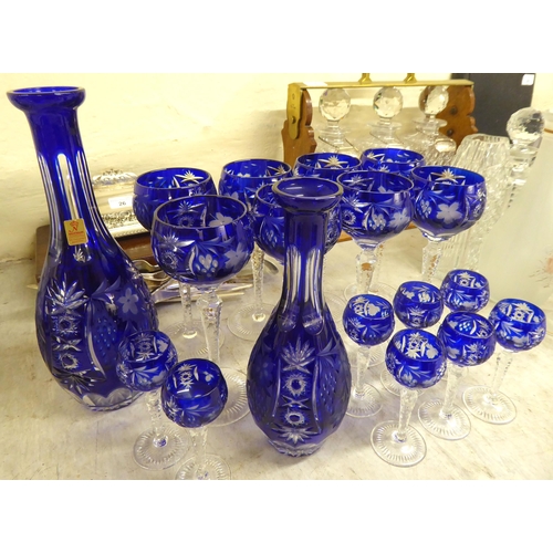 53 - Glassware: to include a set of eight clear and blue coloured hock glasses