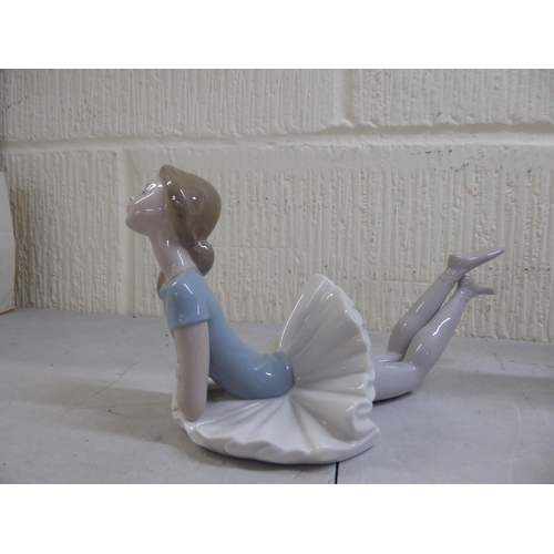 66 - Five Lladro porcelain figures: to include a young woman with two swans at her feet  8