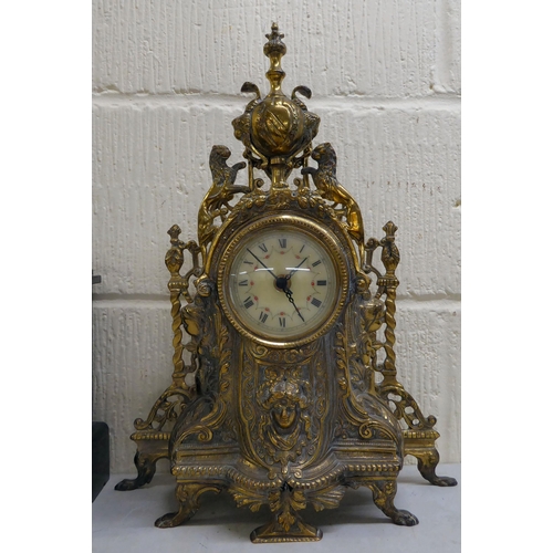 74 - Clocks and timepieces: to include a late 19thC (probably French), black painted and brass mounted ex... 