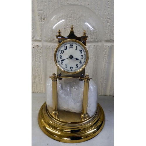 74 - Clocks and timepieces: to include a late 19thC (probably French), black painted and brass mounted ex... 