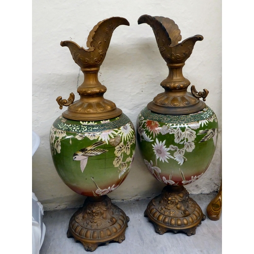 77 - Interior designer accessories: to include a pair of modern Victorian style garniture ewers  22