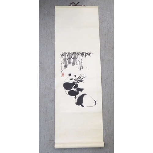 92 - Two 20thC Chinese scrolled watercolours, depicting a horse and pandas