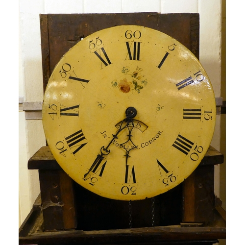 123 - A late 19thC oak cased longcase clock; the movement faced by a Roman and Arabic dial, inscribed JN W... 