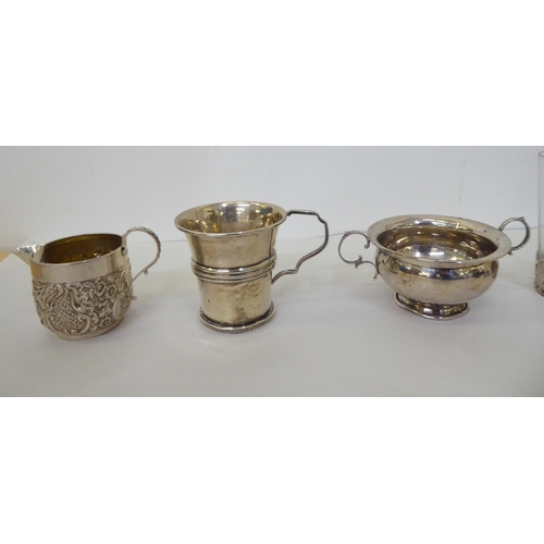 163 - Silver collectables: to include pill boxes; cream jugs; and flatware  mixed marks