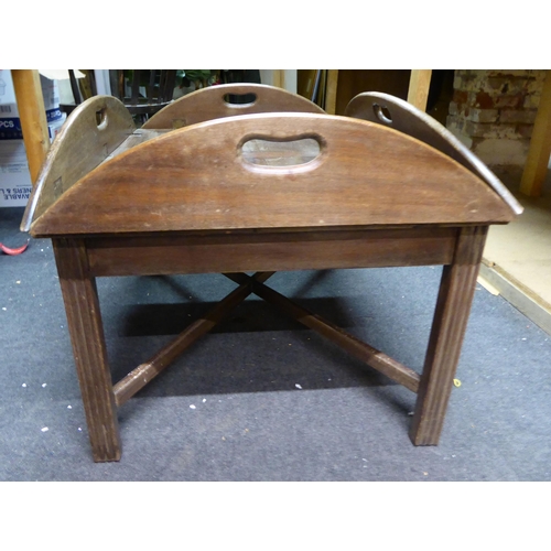 104 - A mid 20thC mahogany hinged tray top design coffee table, raised on square legs  16