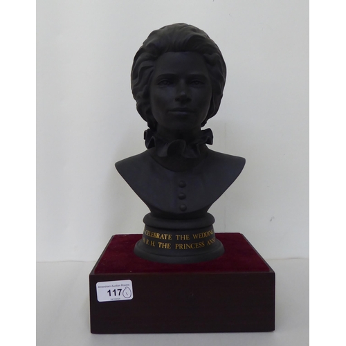 117 - A Royal Doulton black basalt bust, celebrating the Wedding of HRH The Princess Anne  model no.390  1... 