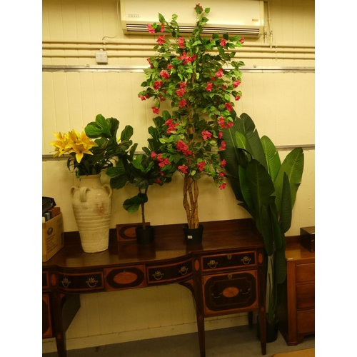 120 - Four dissimilar faux tree/floral arrangements