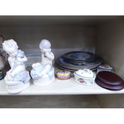 127 - Decorative ceramics: to include collector's plates; ceramic figures; and small trinket boxes