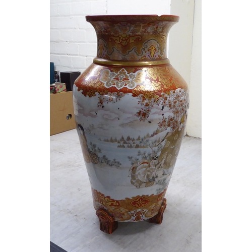 13 - A late 19thC Japanese Kutani porcelain vase, traditionally decorated in iron red and gilding with fi... 