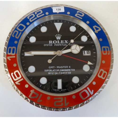 130 - A dealer display advertising wall timepiece for Rolex Oyster Perpetual; the movement faced by a bato... 