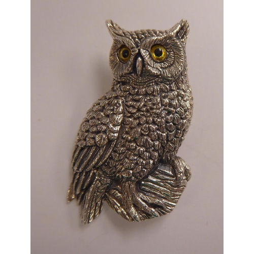 147 - A Sterling silver pendant brooch, fashioned as an owl