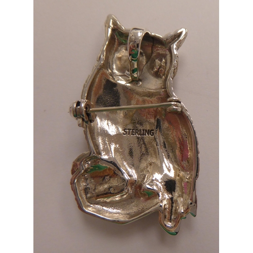 147 - A Sterling silver pendant brooch, fashioned as an owl