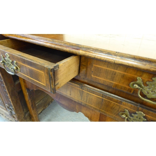 162 - A George III walnut lowboy with two short/one long drawer, raised on chamfered legs  28