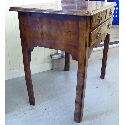 162 - A George III walnut lowboy with two short/one long drawer, raised on chamfered legs  28