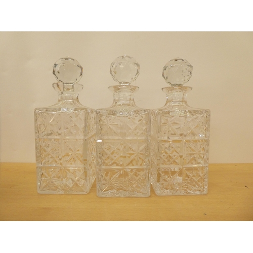 182 - A modern mahogany and silver plated tantalus with three cut glass decanters  13