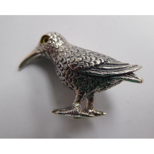 194 - A Sterling silver miniature model, a standing Kiwi