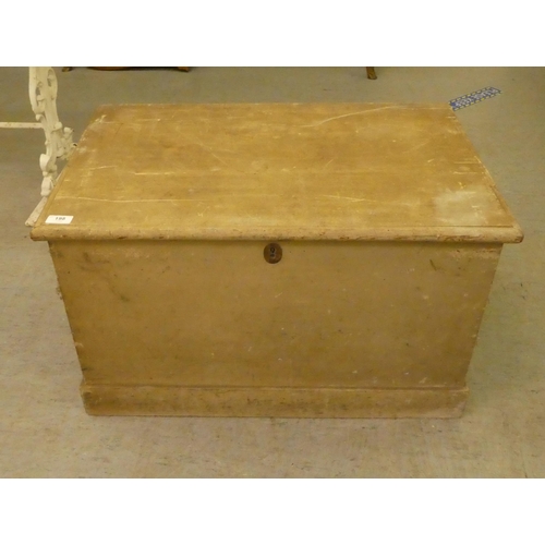 198 - An early/mid 20thC wash painted pine chest with straight sides and a hinged lid  16