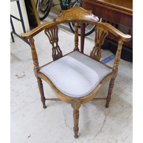 21 - Small 20thC furniture: to include an Edwardian string inlaid, beech framed corner chair, raised on r... 