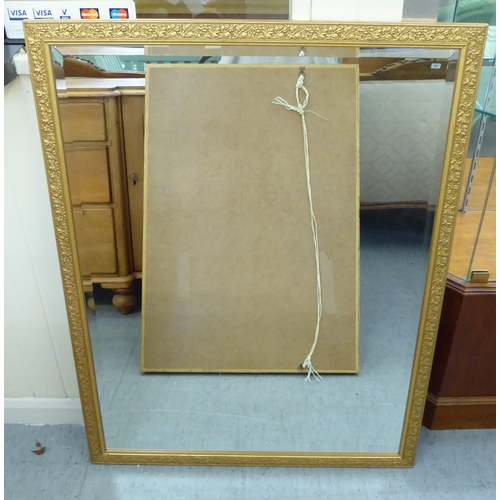 216 - Three similar mirrors, each in a moulded gilt frame  largest 43