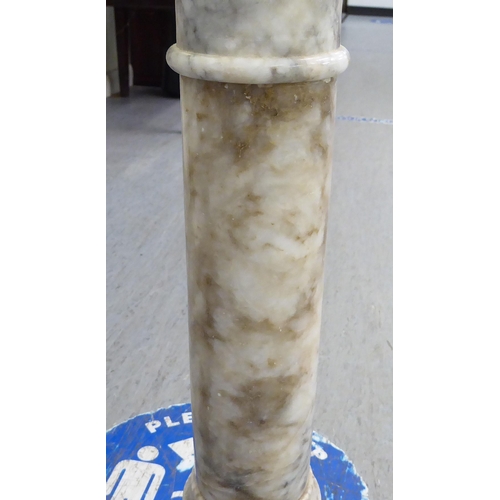 232 - A white/grey marble pedestal  37