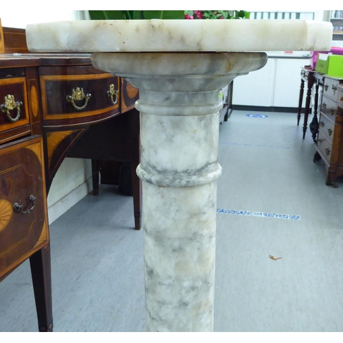 232 - A white/grey marble pedestal  37