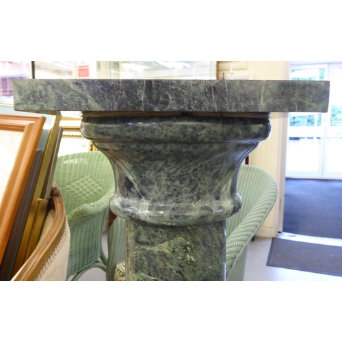 233 - A green marble pedestal  39