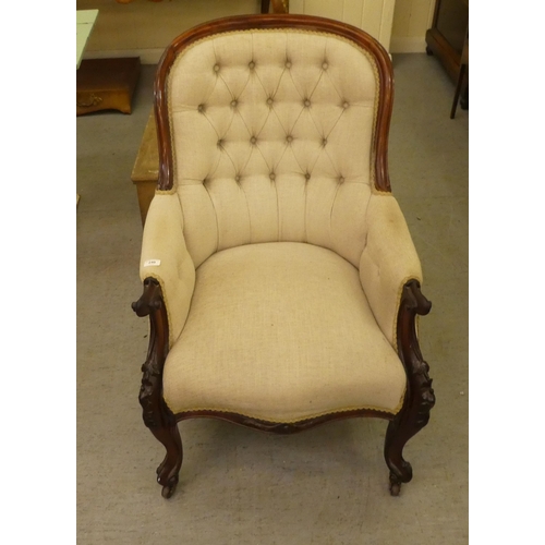 240 - A late Victorian mahogany showwood framed salon chair, part button upholstered in oatmeal coloured f... 