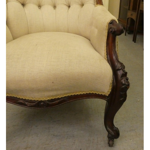 240 - A late Victorian mahogany showwood framed salon chair, part button upholstered in oatmeal coloured f... 