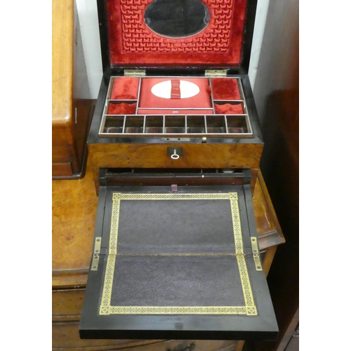 252 - A late Victorian walnut jewellery box with straight sides and a hinged lid, enclosing a part-fitted ... 