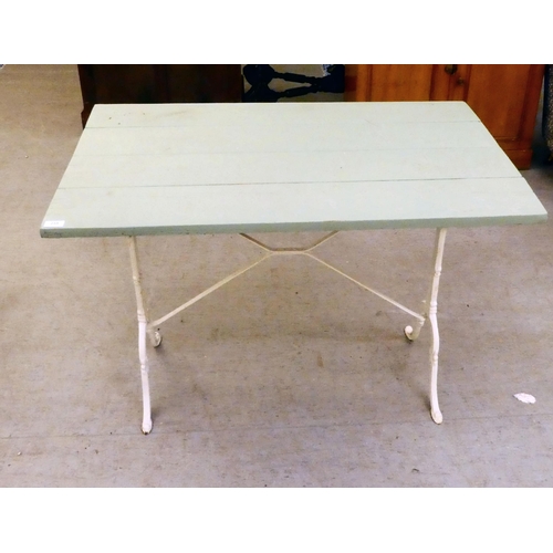 255 - A Victorian style, white painted cast iron framed terrace table with a green painted, planked top&nb... 