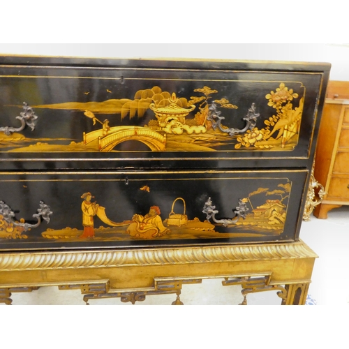 272 - An early 20thC Oriental black painted and gilt decorated, two drawer cabinet-on-stand  35