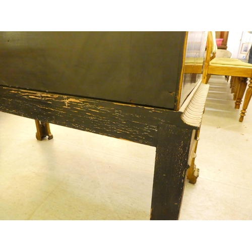 272 - An early 20thC Oriental black painted and gilt decorated, two drawer cabinet-on-stand  35