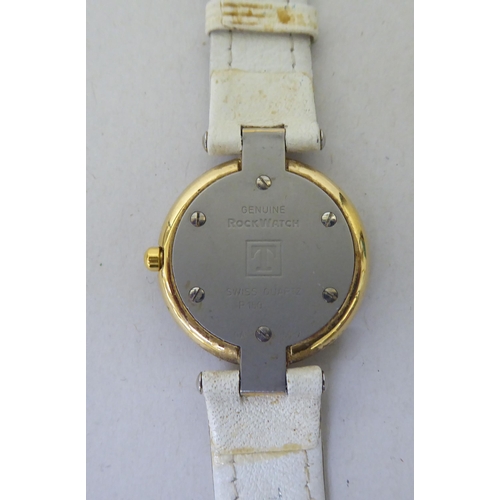 292 - A lady's Tissot Rockwatch with a mother-of-pearl face, on a white hide strap