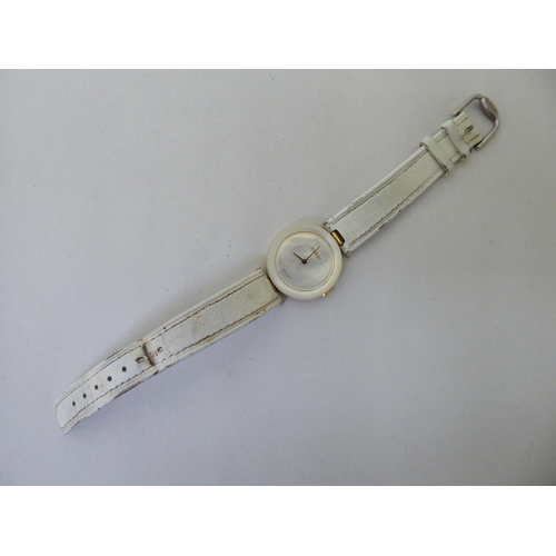 292 - A lady's Tissot Rockwatch with a mother-of-pearl face, on a white hide strap