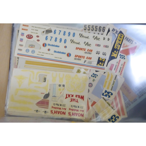 302 - Scale model kits, variously themed albums of decals/stickers