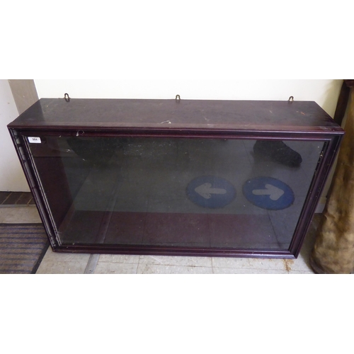 304 - A mid 20thC mahogany finished display case  24