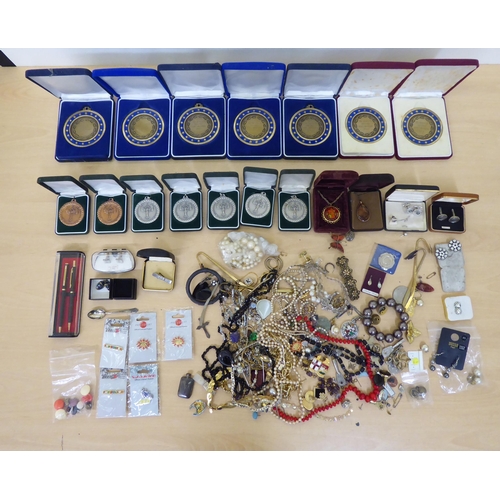 308 - A mixed lot: to include costume jewellery; Sid Horton pewter; and other award medallions