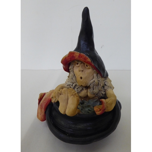 310 - A Halloween themed pottery model, a naked witch, taking a bath in a cauldron  8