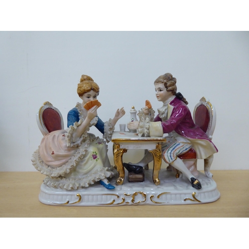 39 - Late 19th/mid 20thC, mainly Continental, porcelain/china figures, a vase and a group with a man and ... 