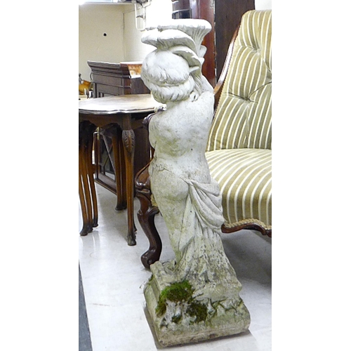 44 - A composition stone bird bath pedestal (only), fashioned as a young boy  32