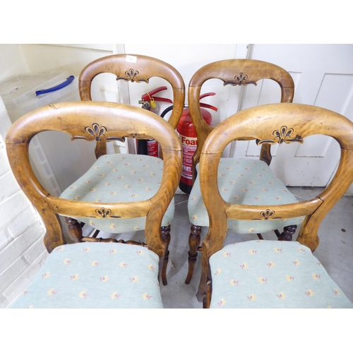 57 - A set of four early 20thC stained beech framed balloon back and later fabric upholstered chairs, rai... 