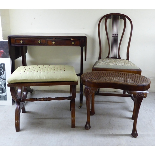 64 - Four items of small furniture: to include a reproduction of a George III sofa table  29