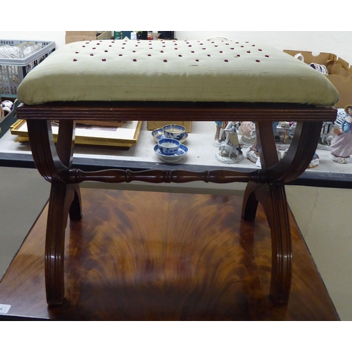 64 - Four items of small furniture: to include a reproduction of a George III sofa table  29