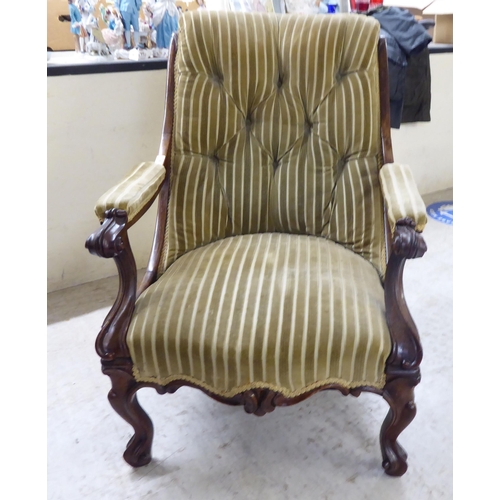 69 - A late Victorian mahogany showwood framed and later, three tone fabric upholstered open arm salon ch... 